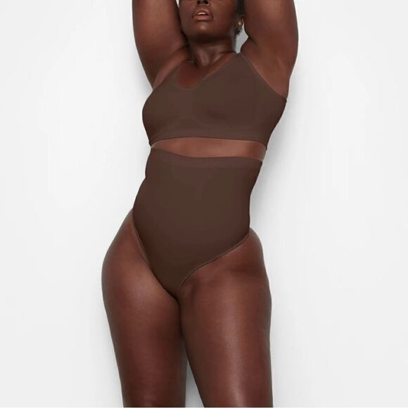 SKIMS Seamless Sculpt High-Waisted Thong in Cocoa - Picture 4 of 5
